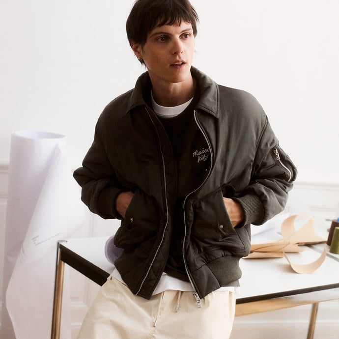 Image of a guy in Maison Kitsune outfit